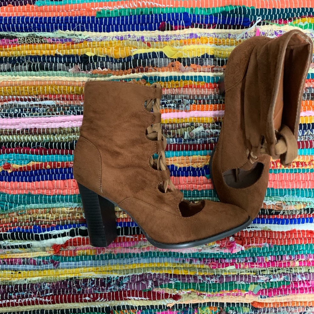 Lace up heels, with cutouts.